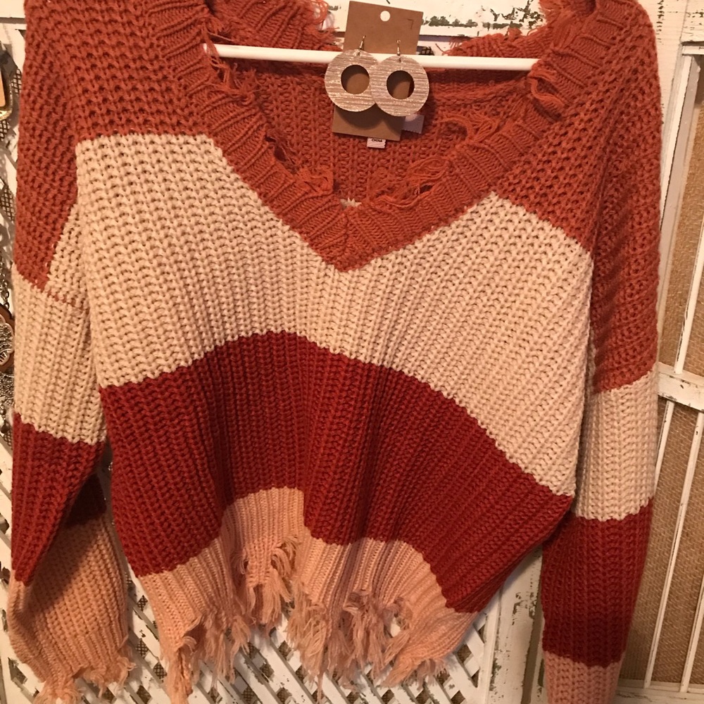 Frayed sweater